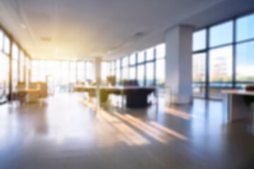 Blurred empty open space office. Abstract light bokeh at office interior background