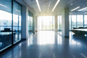 Blurred empty open space office. Abstract light bokeh at office interior background