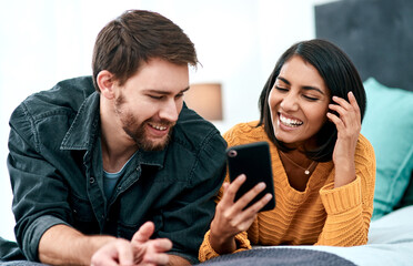 Relax, funny and phone with couple in bedroom for network, social media and internet connection. App, technology and digital with man and woman at home for contact, post and online news together