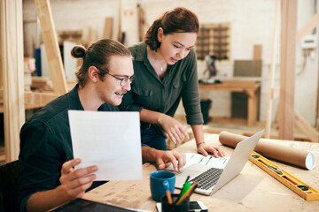 Carpentry, meeting and people on laptop with paperwork for timber, lumber and furniture business....