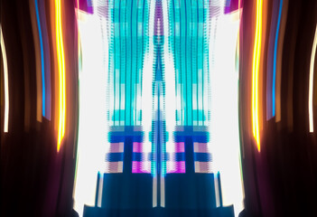 Abstract light art background with dynamic movement is the result of light painting photography capturing speed and energy with elegant lines of light.