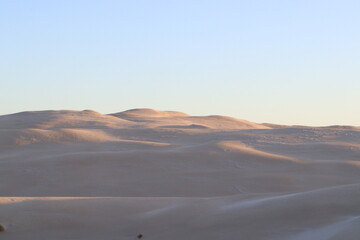sand dunes at sunset