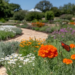 A vibrant garden with colorful flowers and a butterfly in a sunny landscape.