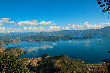 Obraz premium Lugu Lake is currently a famous tourist area, which lies in the juncture of Sichuan and Yunnan Province.