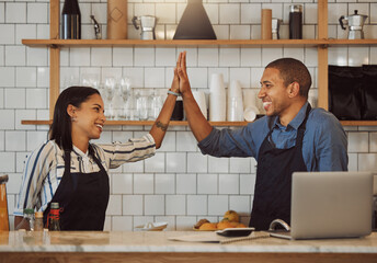 Waiter, people and happy in cafe with high five for startup success, funding loan approval or...