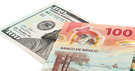 100 US dollar and 100 Mexican pesos bills