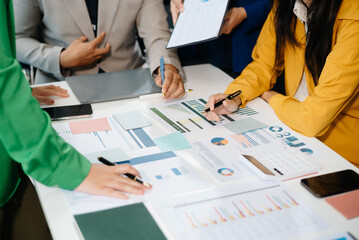 Team work process. Photo young business crew working with new startup project. Project managers meeting.