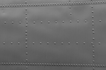 A fragment of a military airplane fuselage.