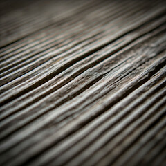A close-up of weathered brown wooden texture with natural grain and rough patterns