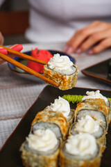 Delicious and fresh rolls with sauce