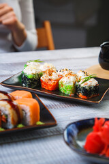 Delicious and fresh rolls with sauce