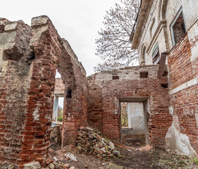 Ruins of an old abandoned building. A manor house of the early 19th century.