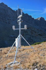Weather station monitoring atmospheric conditions in high altitude mountain environment
