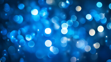 Bright blue bokeh lights creating an abstract background effect during a festive celebration