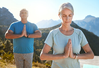 Yoga, woman and couple with prayer hands to meditate in nature for fitness, body health or peace outdoor. Spiritual, calm or senior people with namaste pose for breathing exercise, zen or mindfulness