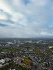 Obraz premium Aerial View of Manchester City During Cloudy and Rainy Day over England UK