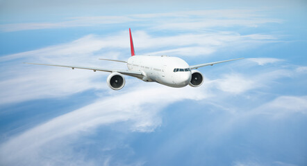 Obraz premium White passenger airplane flying in the sky amazing clouds in the background - Travel by air transport