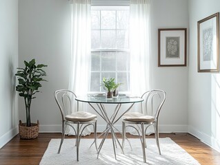 Simple dining room with white walls, a small glass table, and metal chairs