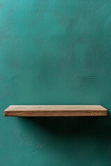 Empty light wood shelf on a sage green wall background for product display, 