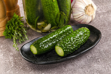 Homemade lighty salted cucumbers with herbs
