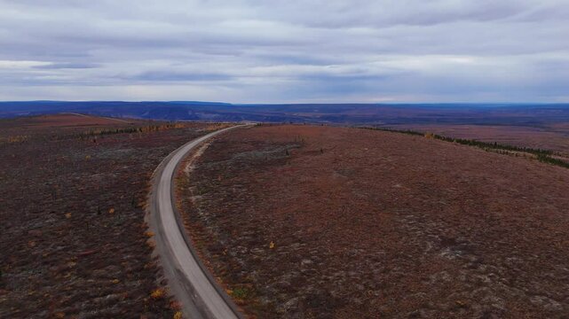 Dempster Highway Through Eagle Plains Tundras In Northern Yukon, Canada. Aerial Drone Shot
