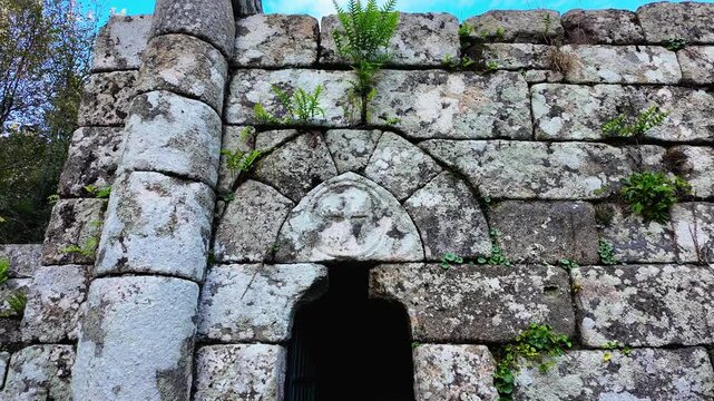 Close-up of the stone entrance and walls of Iglesia de la Ascensi&oacute;n ruins, Santa Mari&ntilde;a de Augas Santas.