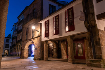 Empty little Rua do Vilar street with historic residential houses and picturesque passages in the...