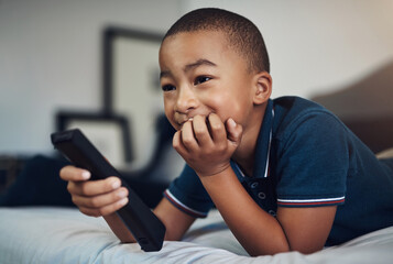 Bedroom, watching tv and child with remote, enjoy and streaming of cartoon, channel and...