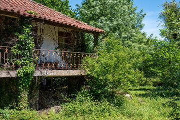 Old abandoned and overgrown house ruin in a small vilage of the Peneda Geres National Park