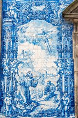 Picturesque historic Azulejo tiles at the exterior of chapel Almas de Santa Catarina in Porto