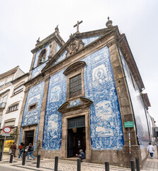 Picturesque historic Azulejo tiles at the exterior of chapel Almas de Santa Catarina in Porto