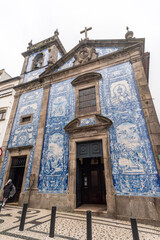 Picturesque historic Azulejo tiles at the exterior of chapel Almas de Santa Catarina in Porto