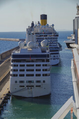Modern mega luxury family cruiseship cruise ship liners lined up in Civitavecchia, Italy Rome port...