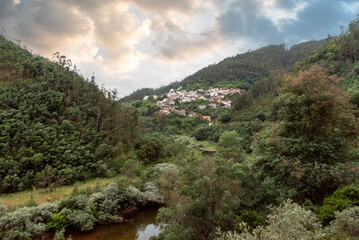 Mondego river near Misarela village flowing through a tranquil forest landscape