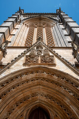 Southern portal to the medieval church of Santa Maria da Vitoria monastery in Batalha, a manueline gothic masterpiece