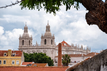 Obraz premium View on the bell towers of church and monastery Sao Vicente de Fora in Alfama district of Lisbon