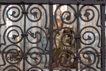 Close view on a medieval wrought iron gate in a European church
