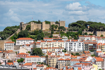 Iconic castle Sao Jorge in Lisbon, seen from viewpoint Sao Pedro de Alcantara