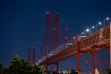 Iconic red bridge of the 25 April in Lisboa at night