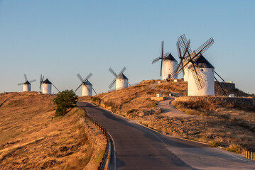 Iconic historic windmills in Consuegra at sunrise, Spain