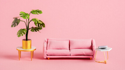 Miniature furniture on a pink background.