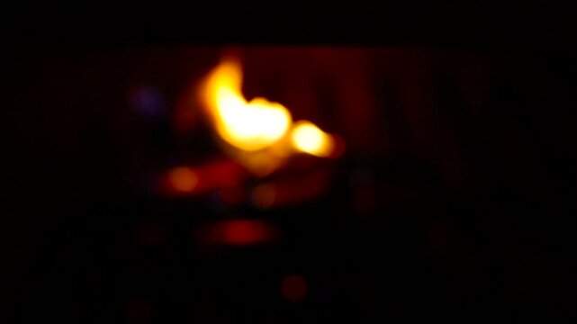  Glowing Fire in the Stone Fireplace Warm Cozy Fireplace with Real Wood Burning in it Winter and Christmas Holidays Concept Slow Motion