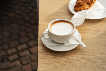 Top view of cup with Italian cappuccino close up 