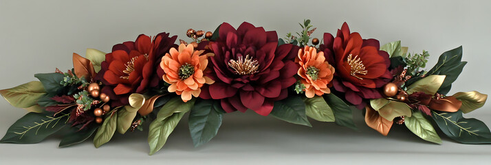 Fall flower arrangement with red, orange, and green flowers and leaves.