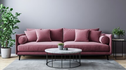 A modern living room with a pink velvet sofa, a round coffee table, and plants.
