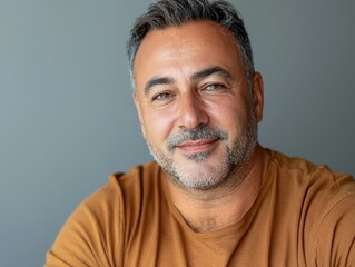 Fototapeta premium Middle-Aged Man with Medium Skin Tone Smiling