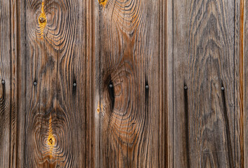 Obraz premium detail of an old wooden wall with nails in the wall