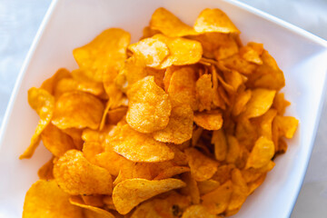 Detail of chips on a white plate