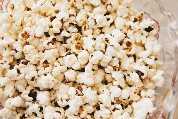 Detail of popcorn inside of a glass bowl
