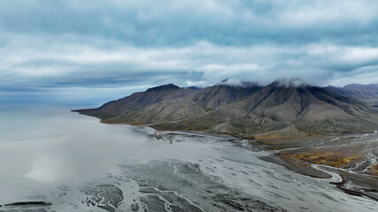 Aerial view of the rugged coastline and mountains in Svalbards unique natural landscape